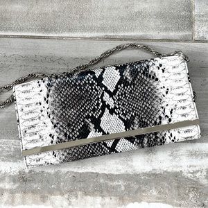 White House Black Market snakeskin print clutch purse